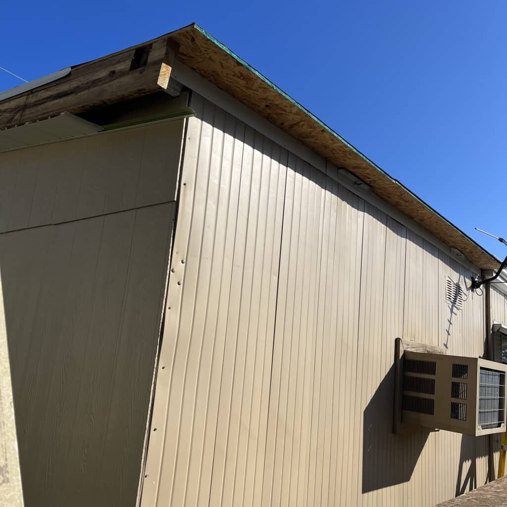 A building with missing sub-fascia about to be installed